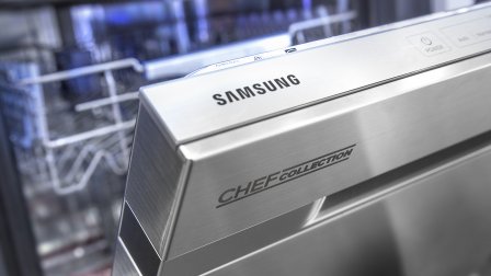 Samsung Chef Collection dishwasher DW80H9970US, door slightly open.